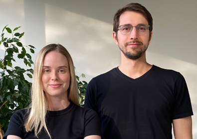 A man and a woman looking at camera.