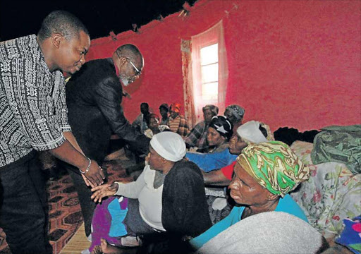 ROYAL VISIT: Acting Thembu king Prince Azenathi Dalindyebo meeting the family whose members were shot dead Picture: LULAMILE FENI