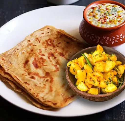 Plain Paratha With Aloo Jeera Sabji And Raita