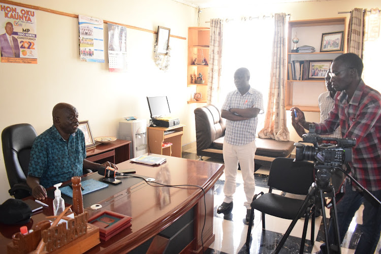 The MP fielding questions from reporters in his office on November 4, 2023.