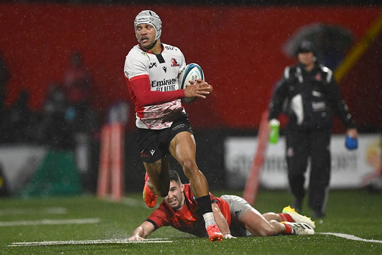 Edwill van der Merwe of the Lions is tackled by Paddy Patterson of Munster in the United Rugby Championship match at Musgrave Park in Cork, Ireland on January 6 2023.