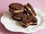 Chocolate and Peanut Butter Sandwich Cookies was pinched from <a href="http://tastykitchen.com/recipes/desserts/chocolate-and-peanut-butter-sandwich-cookies/" target="_blank">tastykitchen.com.</a>