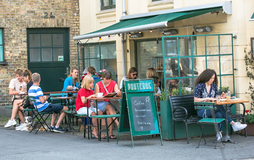 Locals at a cafe in the Christianshavn neighborhood in Copenhagen. 