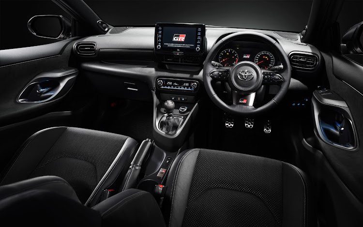 Sports steering wheel and aluminium pedals create a racy mood inside the Yaris GR.