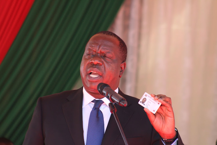 Interior CS Fred Matiangi launching distribution of the Huduma Namba cards at Kiambu county commissioner's office on November 18.