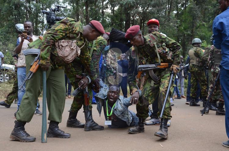 Azimio supporter faints outside the main gate as they welcome Wiper party leader Kalonzo Musyoka outside Bomas on August 15th 2022.