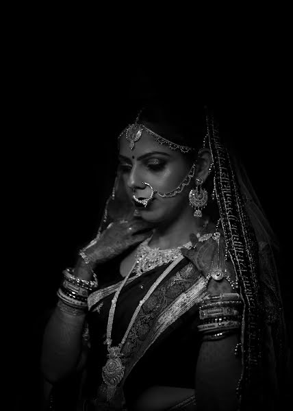 結婚式の写真家Koushik Chakraborty (t0u3yyk)。2022 3月17日の写真