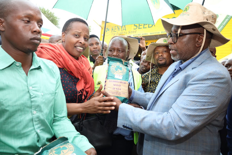 Agriculture Cabinet Secretary Mithinka Linturi istributes frees maize sees in Bomet on January 16,2024.