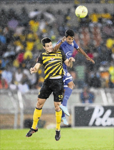 AIRBORNE: Keegan Ritchie of Kaizer Chiefs and Sameehg Doutie of Supersport United during their Premiership match on Saturday. PHOTO: BackpagePix