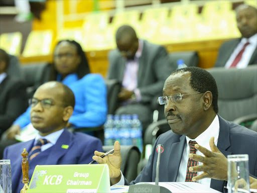 KCB Group chairman Ngeny Biwott addresses shareholders during the lender’s 46th annual general meeting at Safaricom Indoor Arena in Nairobi on Friday /COURTESY