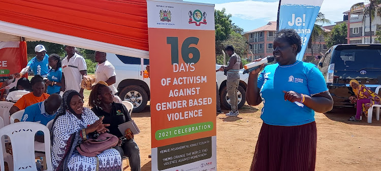 County gender -based violence officer Nelly Amoite speaks at Ukunda in Msambweni sub-county while marking the 16 days of activism against gender-based violence on Friday 10, 2021.