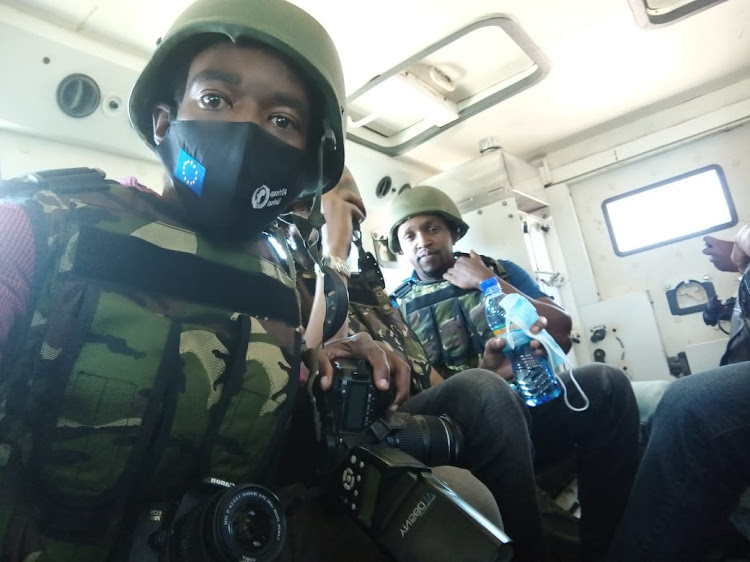 Andrew Kasuku inside one of the Personal Armoured Carriers at Dhobley, Lower Juba, Somalia, on October 5, 2021