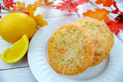 Orange spice cookies on a plate.