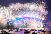 Fireworks are seen over Sydney harbour during New Year's Eve celebrations on January 1 2022 in Sydney, Australia. New Year's Eve celebrations continue to be somewhat different as some Covid-19 restrictions remain in place.