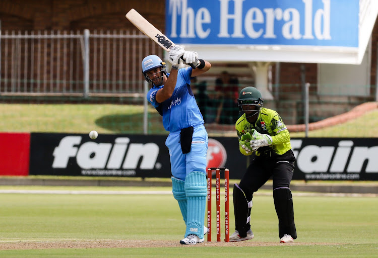 Titans batsman Aiden Markram on his way to 139 against the Warriors at St George's Park. Looking on is Warriors wicketkeeper Sinethemba Qeshile