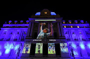 Photographs of late soccer legend Diego Maradona are projected on the Kirchner Cultural Centre, in Buenos Aires, Argentina November 25, 2020.