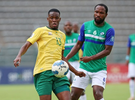 Bafana Bafana midfielder Sphephelo Sithole in a tussle for the ball with Lesotho defender Lisema Lebokollane during their preparation match at Lucas Moripe Stadium, January 10 2024. Picture: SAFA MEDIA