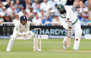 South Africa's Hashim Amla hits a six.