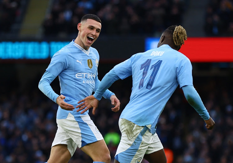 Manchester City's Phil Foden celebrates scoring their fourth goal with Jeremy Doku at Etihad Stadium in Manchester, Britain, January 7 2024. Picture: LEE SMITH/ACTION IMAGES/REUTERS