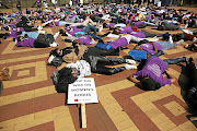 Wits students hold a silent protest against rape.  Activists say police must not only be judged on reducing rape, but also on the way they treat victims.