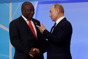 Presidents Vladimir Putin and Cyril Ramaphosa photographed during an official welcoming ceremony for heads of state and governments of member-states of the Russia-Africa Summit in the Black sea resort of Sochi, Russia, in 2019. Sergei Chirikov/Pool via REUTERS/File Photo