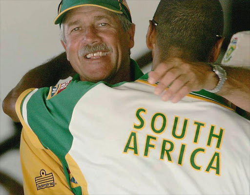 South Africa coach Ray Jennings celebrates in the dressing room after an eight wicket win on the fifth day of the second test between South Africa and the West Indies on April 12, 2005 in Port of Spain, Trinidad.