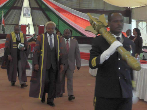 MOVING ON: Laikipia speaker Patrick Mariru and Governor Joshua Irungu arrive in the assembly for the state of the county address on Tuesday.