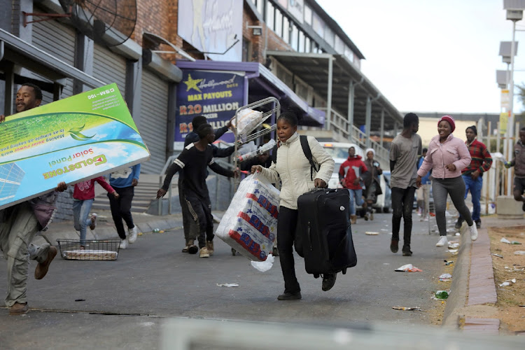 Community leaders in Soweto said they felt helpless as they watched scores of people loot shops and malls during the July 2021 unrest. File photo.