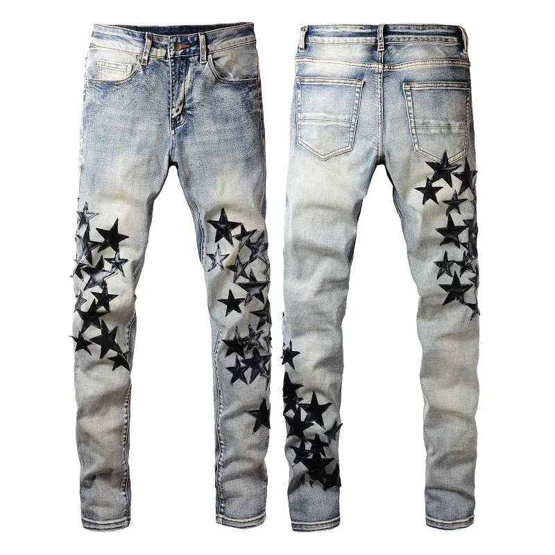 High Street Blue Slim Jeans z rozciągliwym materiałem i pięcioramiennymi gwiazdami. Wygodne i modne spodnie idealne na co dzień.