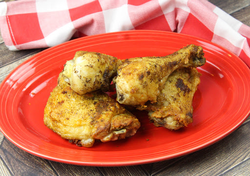 A plate of Grandma's Unbreaded Fried Chicken.