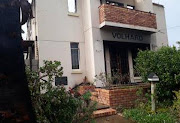 The Knysna High School Hostel, Huis Volhard, burn down during the fires on Wednesday.