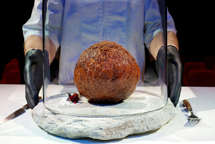 A meatball made from flesh cultivated using the DNA of an extinct woolly mammoth is presented at NEMO Science Museum created by a cultured meat company, in Amsterdam, Netherlands March 28, 2023.