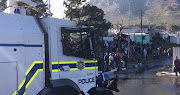 The city council and the police had sent water cannons to the area in a bid to defuse protests. 