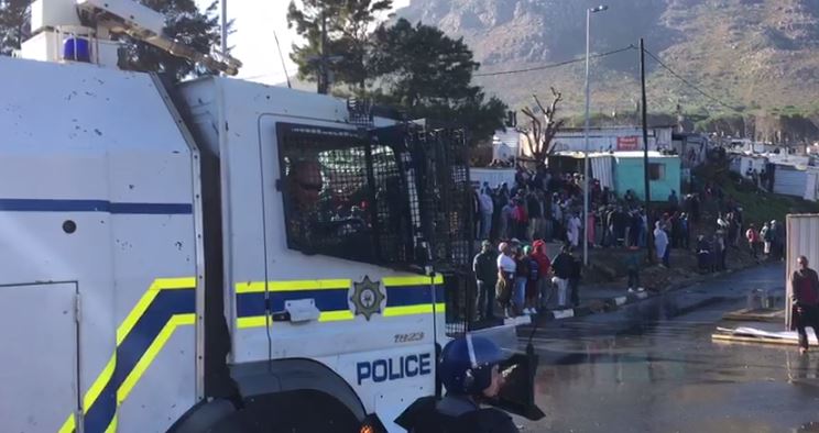 The city council and the police had sent water cannons to the area in a bid to defuse protests.