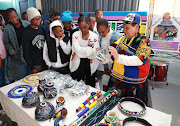 Queen of Ndebele music Nothembi Mkhwebane runs an arts and music center in Pretoria that teaches young and old craft and music. 