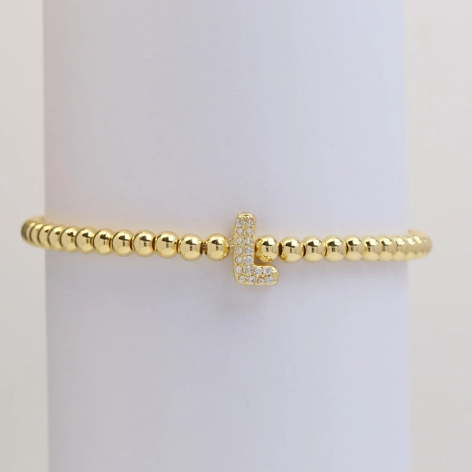Bracelet de perles DIY avec lettres anglaises, micro-incrustations en laiton et motif ballon bulle. Créez votre bijou personnalisé.