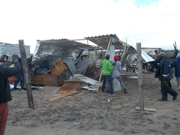 Residents of Siyahlala informal settlement tore down this shack because an immigrant was living in it with his South African wife on 9 June 2018