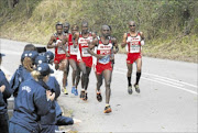 RELAXED: Comrades Marathon winner Ludwick Mamabolo,  right, with some of the other runners. Photos: Gallo Images