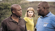 BLOCKBUSTERs: Seiphemo Rapulana, Jodie Whittaker and Kenneth Nkosi in a scene of their feature film White Wedding. 05/05/09. © Unknown.

WINNING TRIO: Rapulana Seiphemo, Jodie Whittaker and Kenneth Nkosi play the main characters in White Wedding. Sowetan. 01/07/2009. Pg 15.