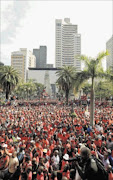 National Union of Metalworkers strikers in Durban. Cosatu general secretary Zwelinzima Vavi told them this was just the start of industrial protest in 2011 Picture: TEBOGO LETSIE