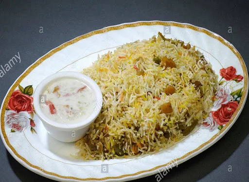 Veg Biryani + Raita +Pickle Combo