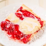 Glazed Cherry Pie Bars was pinched from <a href="http://www.averiecooks.com/2016/01/glazed-cherry-pie-bars.html" target="_blank">www.averiecooks.com.</a>