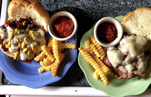 Hot Pastrami with Provolone on a bulky roll served side of fries 