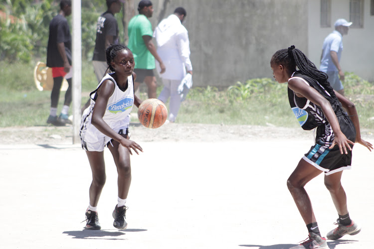 Nyakach (white) vs Mpesa Foundation (Black) in the KSSSA national term one games