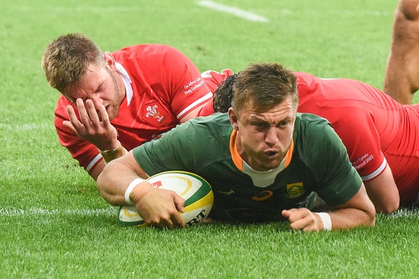 Springbok fly-half Handre Pollard scores a try during the 3rd and final Test match against Wales at the Cape Town Stadium in Cape Town.