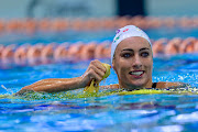 Tatjana Smith smiles after swimming the world's second-fastest 100m breaststroke time so far this year in the heats at the national championships in Gqeberha on Friday morning. 