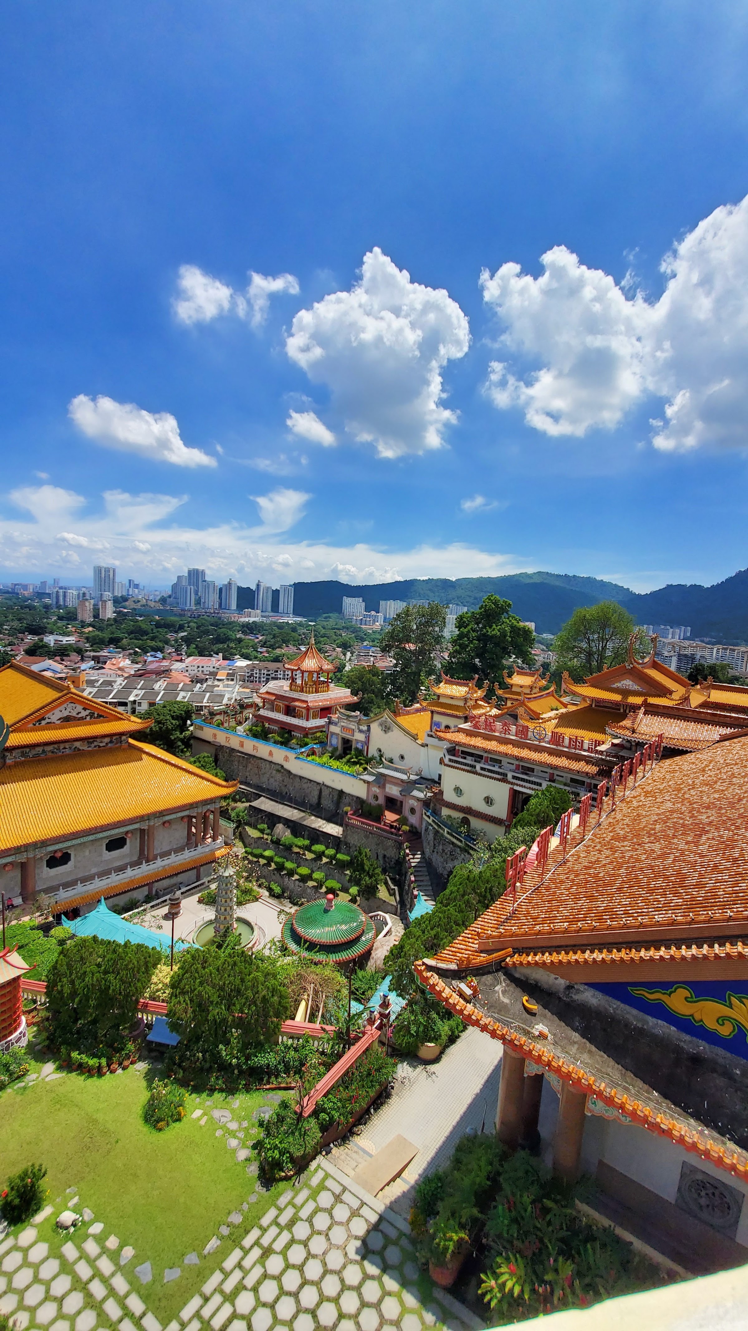 Visiting Kek Lok Si: What makes it unique is that among its millions of Buddhas it shows the blending of cultures that is so representative of Malaysia by including many stylistic representations of Buddha.