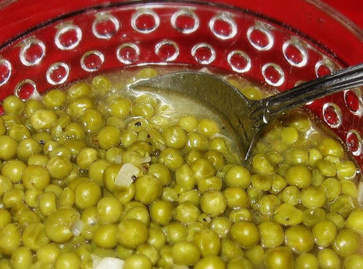 early peas with onion sauteed in bacon drippings