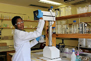 Vivey Pasha  at a laboratory  where she makes sure that  the ingredients going into cosmetic products are safe for use. 