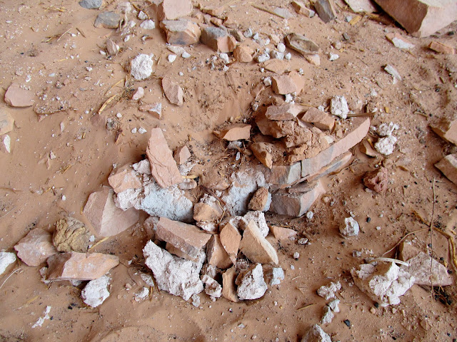 More adobe and rocks, possibly indicating other buried structures